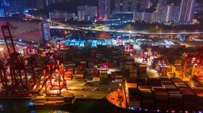 Aerial picture of a sea port at night